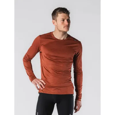 Rustfarvet Fusion Men's Technical Merino 150 LS er den ultimative trøje, der kombinerer merinoulds naturlige egenskaber med polyesters slidstærke kvaliteter. Den innovative to-sidet metervare giver dig en trøje, der er ideel til både hverdagsbrug og træning.