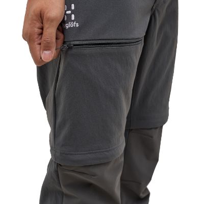 Haglöfs Mid Standard Zip-Off Pant. Disse alsidige bukser kombinerer funktionalitet og komfort med deres slidstærke Climatic™ materiale. Udstyret med to åbne håndlommer og en praktisk lynlåslomme på låret.